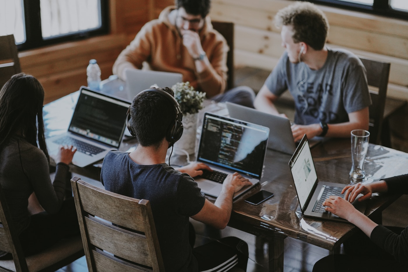 Developers working together at a shared desk